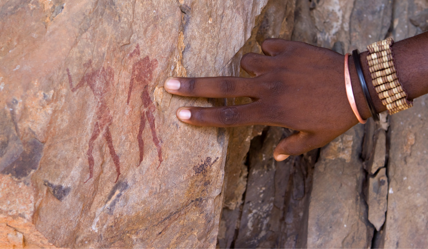 A member of the San and rock art in Namibia